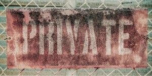 Retro Filtered Photo Of Rusty Grungy Old Private Property Sign On Chain Link Fence