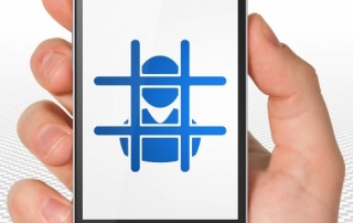 Law concept: Hand Holding Smartphone with blue Criminal icon on display